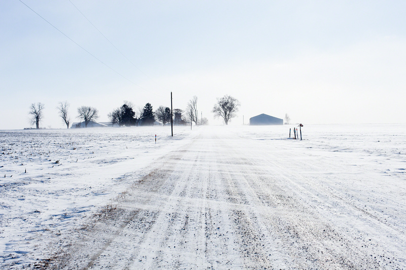 Wind Blowing Snow Across the Road